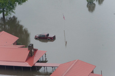 August 2017 - Texas, United States: Hurricane Harvey flooding in Port Arthur, Texas, August 30, 2017. Hurricane Harvey formed in the Gulf of Mexico and made landfall in southeastern Texas, bringing record flooding and destruction to the region. U.S. military assets supported FEMA as well as state and local authorities in rescue and relief efforts. (POLARIS)