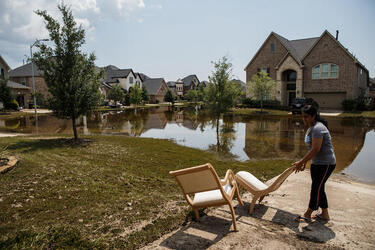 September 2, 2017 - Fort Bend County, Texas, United States: Local residents clear out damaged furniture in homes damaged in the aftermath of tropical storm Harvey, in the Millwood subdivision of Fort Bend County. (Marcus Yam / Los Angeles Times/Polaris)