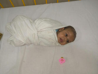 PIC BY CATERS NEWS- (Pictured: 45-day old Priyom Choudhary from Mumbai, India after the operation to remove the tumor his heart.) Doctors in India have given a new lease of life to a 45-day-old baby after removing an extremely rare form of tumour from his heart but say credit goes to his father whose timely Cardiopulmonary resuscitation (CPR) saved the babys life. Priyom Choudhary from Mumbai underwent a complex paediatric heart surgery with a giant tumour in his heart. But to reach the hospital was no less than a miracle for the baby as he was struggling to breathe in the ambulance. All credit goes to his father who bravely took the right decision and administered CPR to his baby who was struggling to breathe. It helped the baby to reach the hospital in a stable condition, said Dr Biswa Panda, Head of the Paediatric Cardiac Surgery department at Wadia Childrens Hospital in Mumbai. SEE CATERS COPY