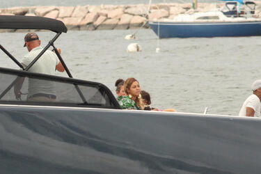 Makeup free Beyonce sets sail on luxury yacht in playful green frock and bold gold earrings during Hamptons getaway Makeup free Beyonce sets sail on luxury yacht in playful green frock and bold gold earrings during Hamptons getaway
