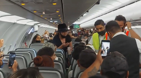 Drunk Plane Passenger Kicked Off For No Mask Rant
 Video available 