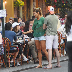 Kelly Bensimon pushing her Citi Biki and going for lunch in short shorts
