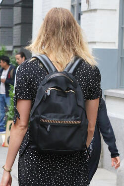 Karlie Kloss in a black and white polka dot dress out in the West Village