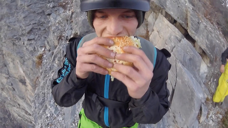 HAMBURGER AND FLIES HILARIOUS MOMENT BASE JUMPER OFF OFF THE SIDE OF A CLIFF WHILE EATING HIS LUNCH with video 