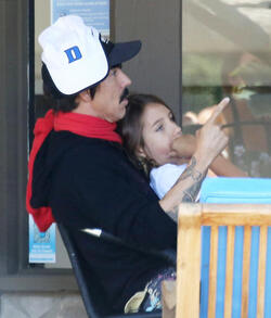 Doting dad Anthony Kiedis cuddles with son Everly Bear during lunch outing Doting dad Anthony Kiedis cuddles with son Everly Bear during lunch outing