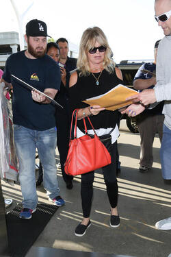 Kurt Russell and Goldie Hawn are seen at LAX Kurt Russell and Goldie Hawn are seen at LAX