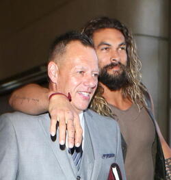Jason Momoa Clutches His Favorite Pillow Going Through LAX TSA