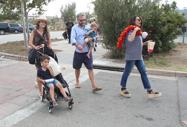 Jordana Brewster smiles big at the fair with her sons and parents Jordana Brewster smiles big at the fair with her sons and parents