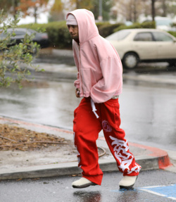 Disheveled Justin Bieber goes go karting in the rain