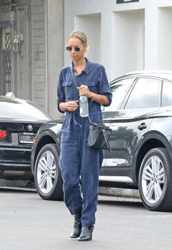 Slender Leona Lewis proves her stylish flair in utility inspired jumpsuit as she treats herself to a pampering session at the hair salon in LA