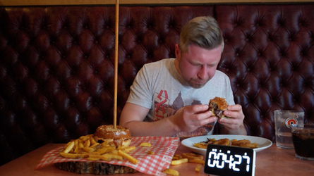 Foodie Smashes Record For Huge Burger Tower Challenge Foodie Smashes Record For Huge Burger Tower Challenge