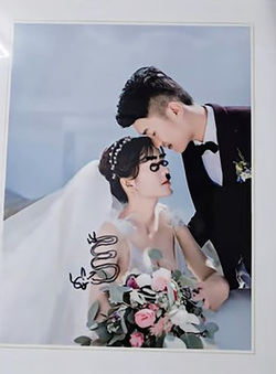 Husband Ruins Expensive Wedding Photos With Black Marker After Losing Argument To Wife Husband Ruins Expensive Wedding Photos With Black Marker After Losing Argument To Wife