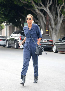 Slender Leona Lewis proves her stylish flair in utility inspired jumpsuit as she treats herself to a pampering session at the hair salon in LA