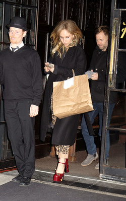 Juno Temple is pictured chatting on a cellphone outside her hotel in New York City.