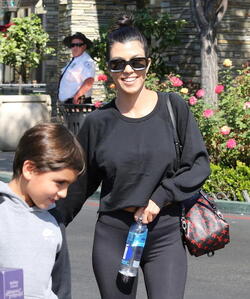 Kourtney Kardashian Is All Smiles After Treating The Kids To A Movie