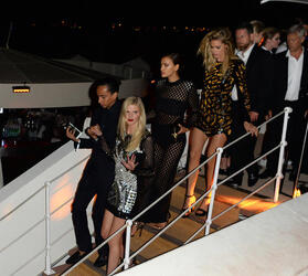 Lara Stone Doutzen Kroes and Irina Shayk leave yacht after L Oreal party in Cannes