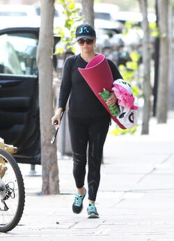 Reese Witherspoon attends her morning yoga session before taking a jog with a girlfriend in Brentwood.