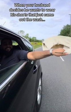 Time strapped Brit leaves drivers cackling hanging SHORTS out car window in quick dry hack