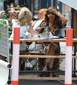Lizzie Cundy and Anthea Turner seen having a drink with friends in soho