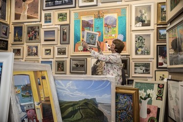 Sophie Miller of the Llewellyn Alexander gallery in Waterloo sifts through the approximately 600 works of art that has been rejected from the annual prestigious Royal Academy exhibition Sophie Miller of the Llewellyn Alexander gallery in Waterloo sifts through the approximately 600 works of art that has been rejected from the annual prestigious Royal Academy exhibition