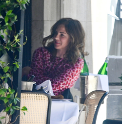 Trinny Woodall smokes outside at Scotts