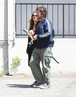 Christian Bale and his wife their their son out for breakfast