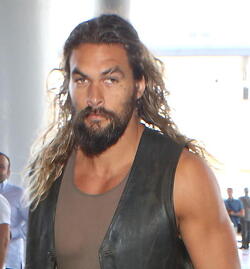 Jason Momoa Clutches His Favorite Pillow Going Through LAX TSA