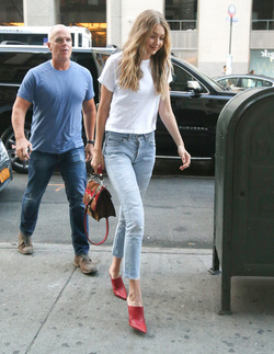 Gigi Hadid leaves her apartment in a plain white tee and red heels Gigi Hadid leaves her apartment in a plain white tee and red heels