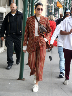 Kendall Jenner Accessorizes a Striped Suit with a Louis Vuitton Fanny Pack Kendall Jenner Accessorizes a Striped Suit with a Louis Vuitton Fanny Pack