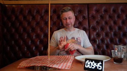 Foodie Smashes Record For Huge Burger Tower Challenge Foodie Smashes Record For Huge Burger Tower Challenge
