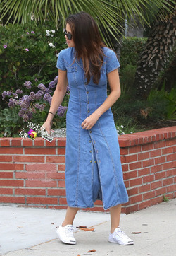 Selena Gomez Greeted by a fan While out With Bodyguard