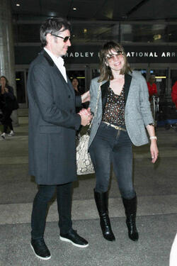 Milla Jovovich and Paul Anderson pictured at Los Angeles International Airport Milla Jovovich and Paul Anderson pictured at Los Angeles International Airport