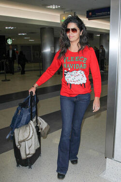 Camila Alves wearing Christmas jersey