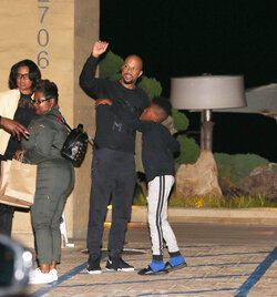 Common enjoys a night out with family at Soho