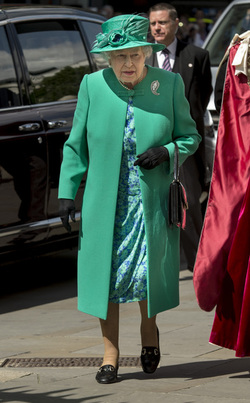 Queen Elizabeth II and Prince Philip Duke of Edinburgh attend a service to mark the 100th anniversary of the Order of the British Empire at St Paul s Cathedral in London.