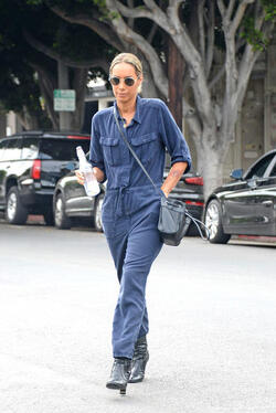 Slender Leona Lewis proves her stylish flair in utility inspired jumpsuit as she treats herself to a pampering session at the hair salon in LA