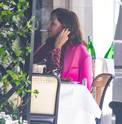 Trinny Woodall smokes outside at Scotts