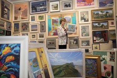 Sophie Miller of the Llewellyn Alexander gallery in Waterloo sifts through the approximately 600 works of art that has been rejected from the annual prestigious Royal Academy exhibition Sophie Miller of the Llewellyn Alexander gallery in Waterloo sifts through the approximately 600 works of art that has been rejected from the annual prestigious Royal Academy exhibition