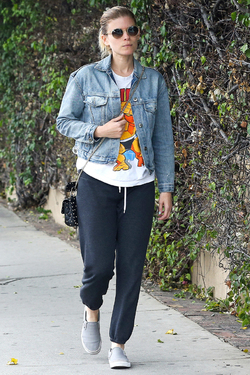 Kate Mara looks comfy in sweatpants and denim jacket while out and about