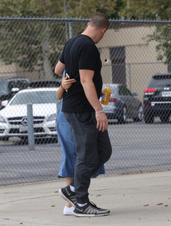 Selena Gomez Greeted by a fan While out With Bodyguard