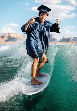 HIGH SCHOOL GRADUATE TAKES UNIQUE GRADUATION PHOTOS WHILE WAKESURFING