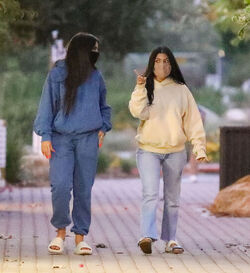 Kourtney Kardashian 41 and her TikTok star BFF Addison Rae 19 wear matching hoodies for dinner in Malibu