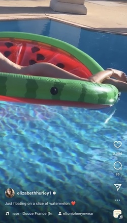 Liz Hurley poses totally nude on a slice of watermelon Liz Hurley poses totally nude on a slice of watermelon