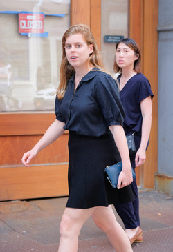 rincess Beatrice of York beats the heat in a short skirt as she walks in Soho
