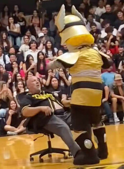 High School Principal Placed on Leave After Dancing with Mascot at School Rally One Father Says It Was All Weird 