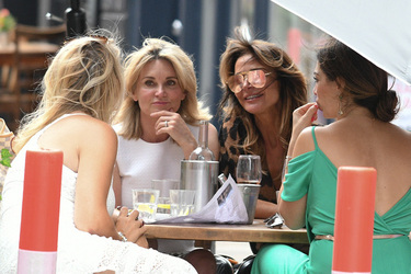 Lizzie Cundy and Anthea Turner seen having a drink with friends in soho