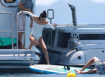 Kendall Jenner takes paddle board lessons in Cannes