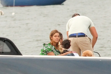 Makeup free Beyonce sets sail on luxury yacht in playful green frock and bold gold earrings during Hamptons getaway Makeup free Beyonce sets sail on luxury yacht in playful green frock and bold gold earrings during Hamptons getaway