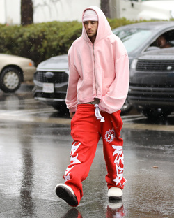 Disheveled Justin Bieber goes go karting in the rain