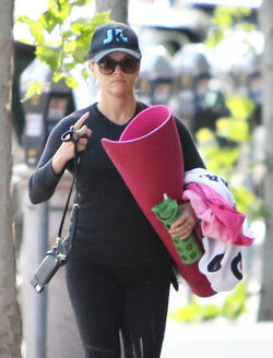 Reese Witherspoon attends her morning yoga session before taking a jog with a girlfriend in Brentwood.